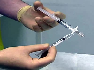 Foam being prepared by mixing sclerosant with air